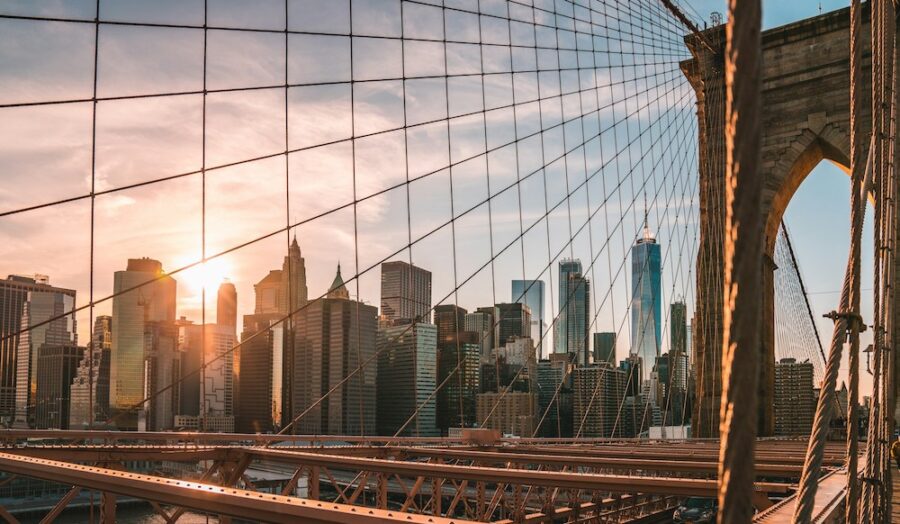 View of the New York City skyline from the Brooklyn Bridge when searching for cafes to work in NYC with a laptop