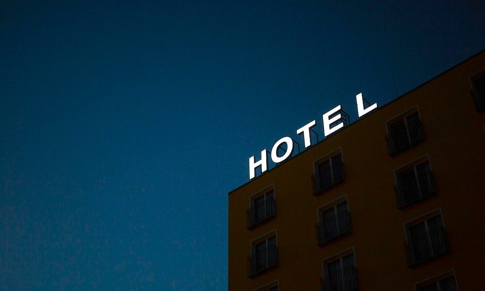 Silhouette of a hotel building against a dark sky
