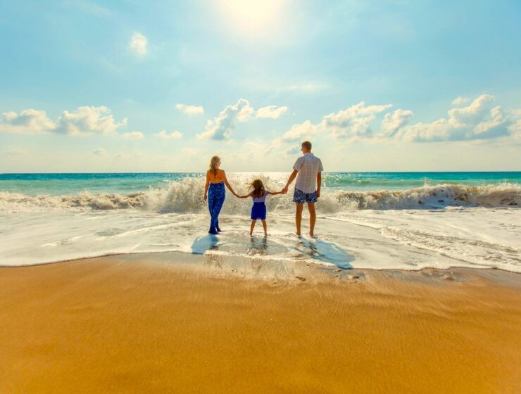 digital nomad family on the beach