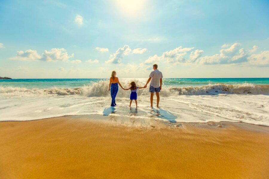 digital nomad family on the beach